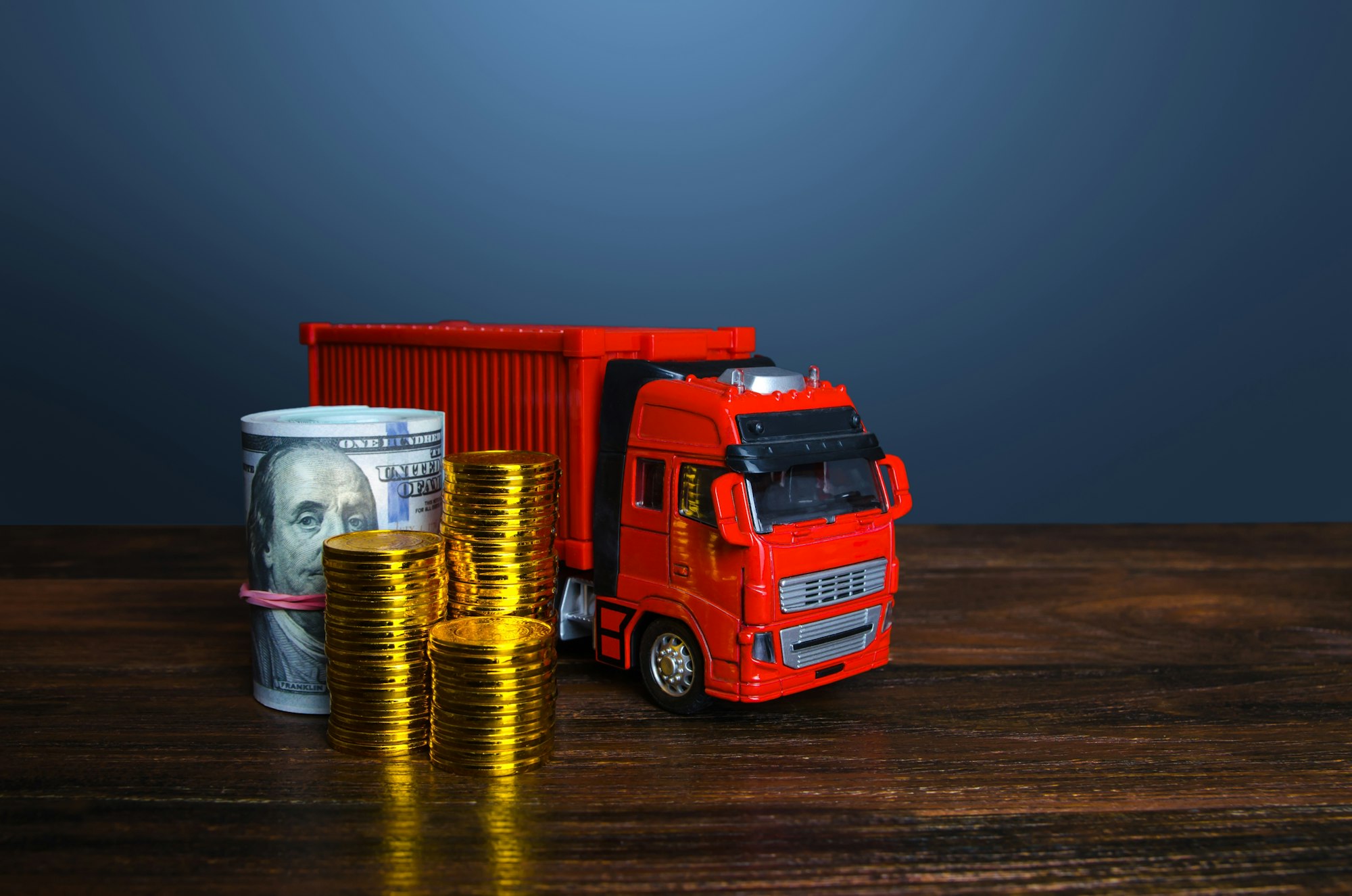 Freight truck and money.